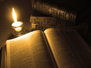 Candle lit book table candle - a candle free wallpaper