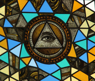 Stained glass window triangle eye - a stained glass window free wallpaper