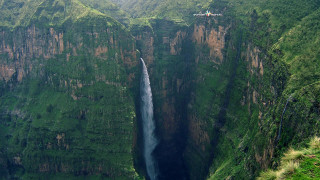 Waterfall valley helicopter flying boat - a helicopter free wallpaper for desktop
