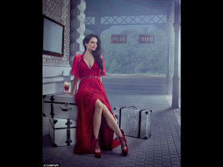 Woman red dress sitting suitcase - a drink free wallpaper