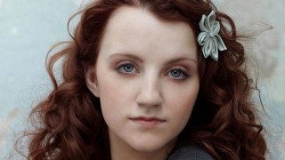 Woman red hair flower serious 2 - aileen eagleton free wallpaper