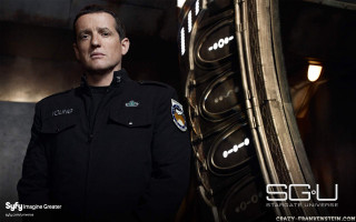 Man black coat clock tower - a sci free wallpaper for desktop