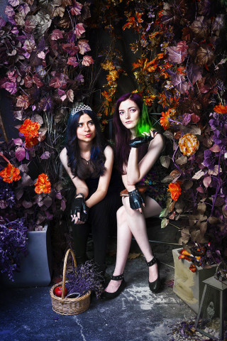 Two women black flower display - two woman free wallpaper for mobile