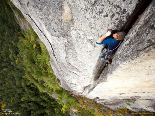 Man climbing cliff backpack superflat - epic scale free wallpaper