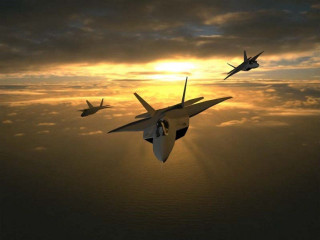 Fighter jets cloudy sky sunset - the sun behind them free wallpaper
