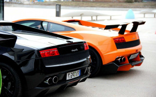 Orange black sports cars parked - sharp line free wallpaper for desktop