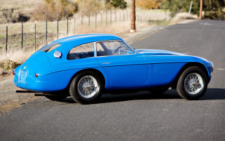 Blue car road fence field - the side of a road next free wallpaper