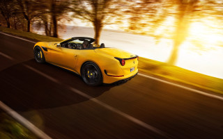 Yellow sports car driving road 5 - the sun free wallpaper