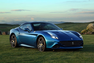 Blue sports car field mountains - a blue sports car free wallpaper for desktop