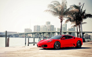 Red sports car city skyline 4 - luxury free wallpaper