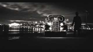 Man car pier night city - free retro wallpaper
