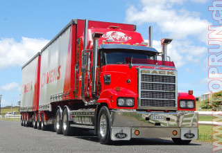 Red truck driving road sky - a white fence free wallpaper