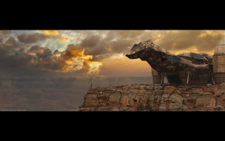 Large structure rocky cliff sky - a sun setting free wallpaper