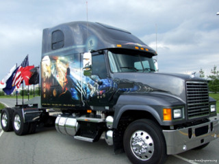 Semi truck man painting space - a semi truck free wallpaper