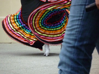 Person walking street colorful skirt - color free wallpaper