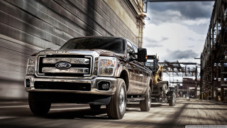 Truck driving street building construction - a truck free wallpaper for desktop