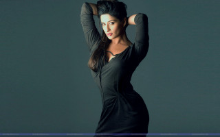 Woman black dress posing hands 6 - dark background free wallpaper