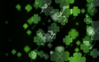 Green shamrocks hearts black background - charles mcauley free wallpaper