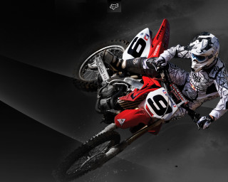 Man motorcycle dirt bike track - a dark background behind free wallpaper