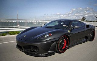 Black sports car road bridge 3 - a bridge and a body of water free wallpaper