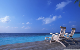 Ocean dock palm chairs sky - two chair free wallpaper