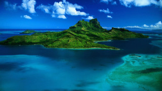 Small island water clouds plane 5 - a small island free wallpaper