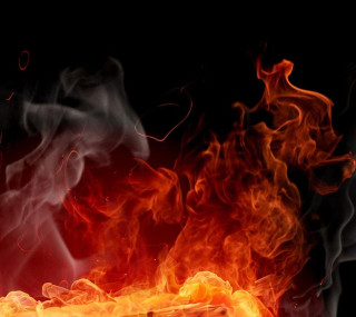 Fire burning black background red - the middle free wallpaper for tablet