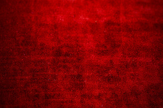Red background grungy texture red - a red light in the middle free wallpaper