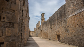 Narrow street stone wall clock - david chipperfield free wallpaper