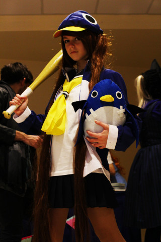 Woman costume baseball bat penguin - a woman in a costume holding free wallpaper for mobile