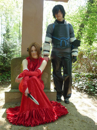 Woman red dress man costume - andor basch free wallpaper for mobile