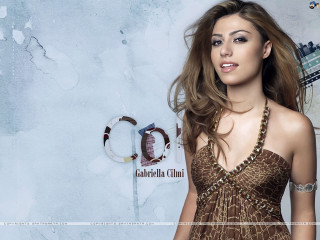 Woman brown dress cityscape pose - a brown dress free wallpaper for desktop