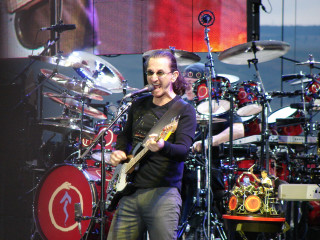 Man playing guitar on stage 3 - christopher rush free wallpaper