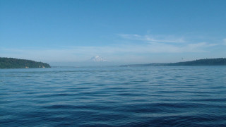 Water mountain blue sky clouds - a mountain in the distance free wallpaper