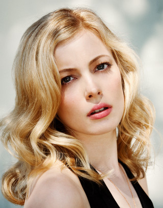 Blonde black dress necklace posing - free portrait wallpaper