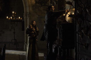 Man woman dark room candles - the wall and a clock free wallpaper