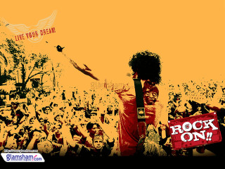 Man flying kite crowd rock - front of him free wallpaper