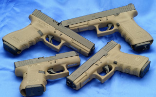 Guns group different sizes blue - a blue background behind them free wallpaper