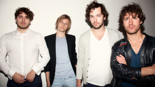 Men group arms crossed white - bauhaus free wallpaper