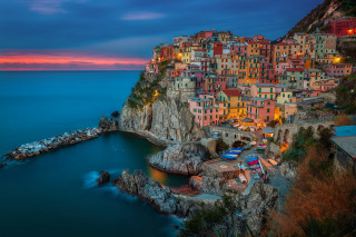 Small village cliff ocean dusk - a small village free wallpaper