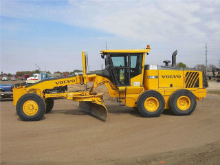 Yellow tractor parking lot snow - the back of its free wallpaper