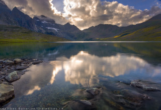 Lake mountains cloudy sky rocks 4 - mountain under a cloudy sky free wallpaper