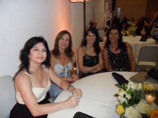 Women candles flowers table gathering - the table in front free wallpaper