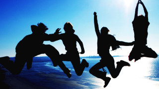 Beach jumping group sun ocean - energetic free wallpaper
