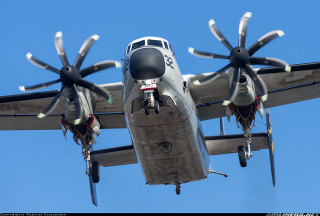 Propeller plane flying blue sky 2 - wing and a propeller free wallpaper