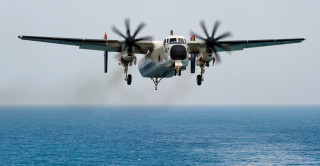 Propeller plane ocean clear day - a clear day free wallpaper