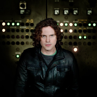 Man black jacket control panel - private free wallpaper for tablet