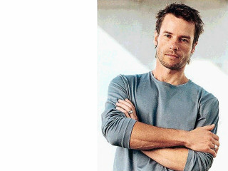 Man arms crossed serious expression - mitchell mohrhauser free wallpaper