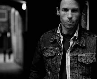 Man denim jacket tie doorway - david annand free wallpaper