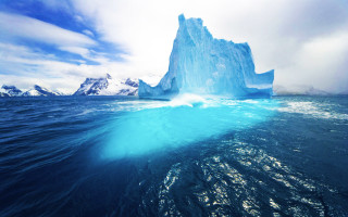 Iceberg floating ocean blue sky 2 - free ship wallpaper